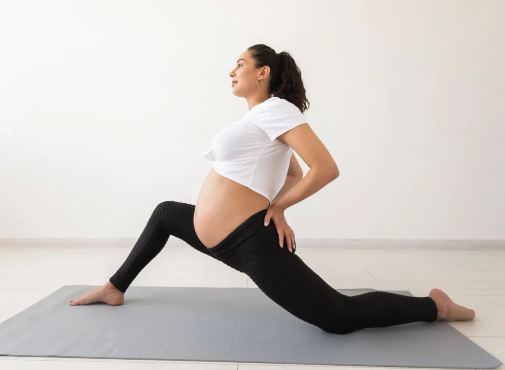 purposeful pregnant woman exercises during yoga cl 2023 11 27 04 56 23 utc